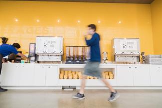 Man walking inside dining hall